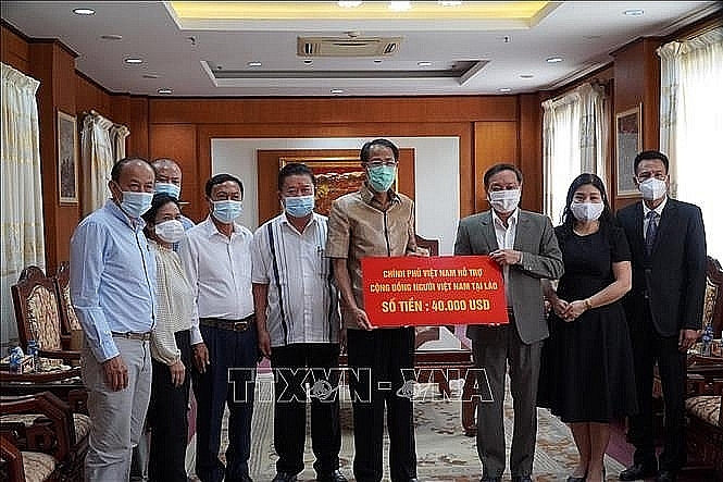 Правительство Вьетнама выделило 40 тыс. долларов для поддержки вьетнамцев в Лаосе в рамках борьбы с эпидемией COVID-19