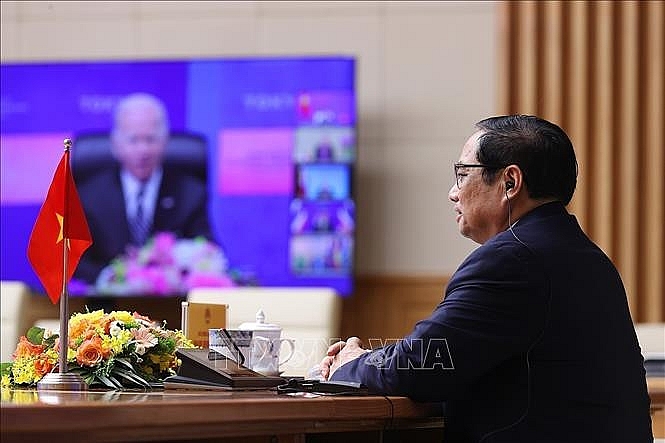 Премьер-министр Фам Минь Тинь принял участие в церемонии запуска новой IPEF по видеосвязи