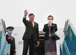 Вьетнамско-лаосские отношения после визита генерального секретаря , президента Лаоса Тхонглуна Сисулита