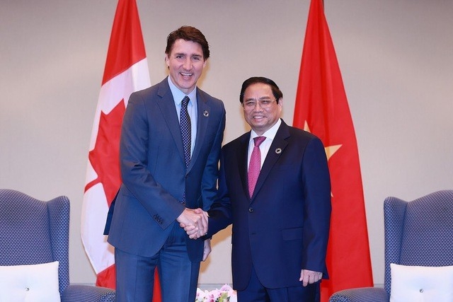 Премьер-министр Фам Минь Чинь встречается с Премьер-министром Канады Джастином Трюдо на полях расширенного саммита G7 в Хиросиме (Япония) в мае 2023 года